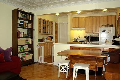 View of kitchen and cabinets from the living room