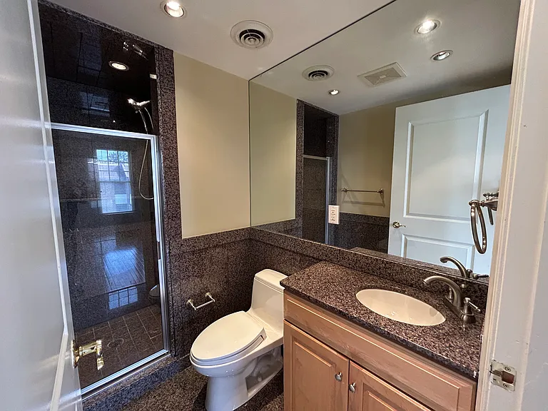 Second floor front granite bedroom bathroom
Walk in shower w/ 3 faucets
