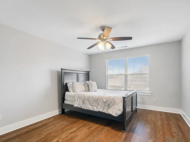 Large spare bedroom with huge walk-in closet.