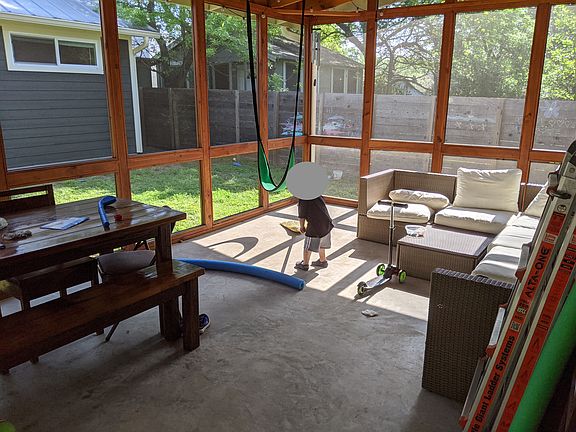 Screened in porch in the backyard