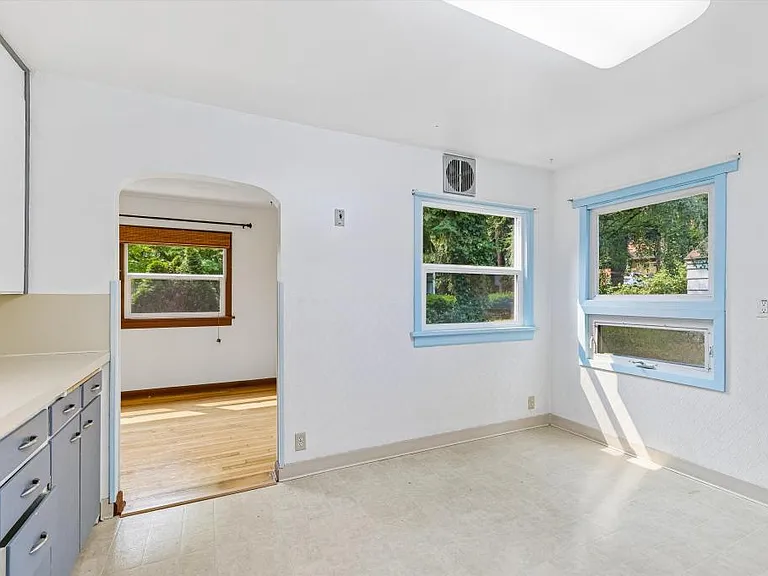 Kitchen w/ view of entrance to living room