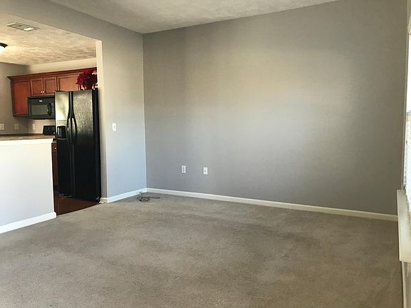 Freshly painted natural gray and carpets have been professionally cleaned. High ceilings throughout