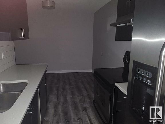 4th image of 8215 83rd Ave NW #210