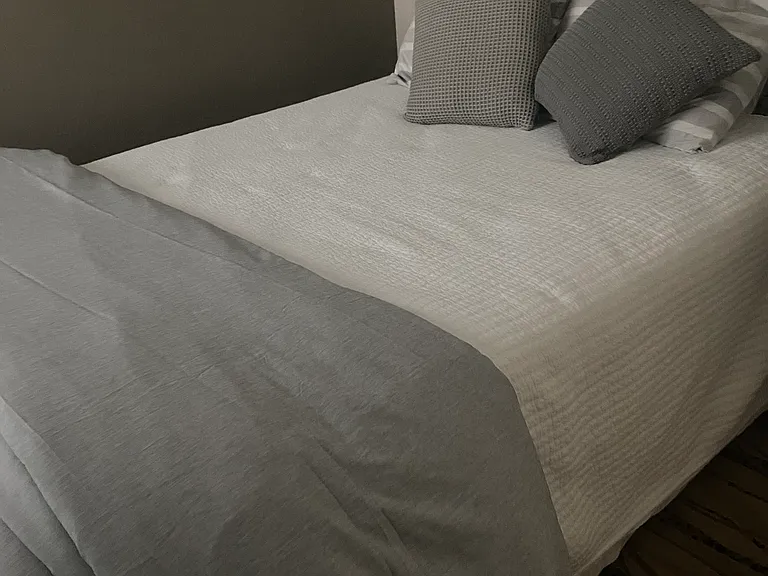 queen bed, electric mattress pad. down comforter. Shutters for darkening