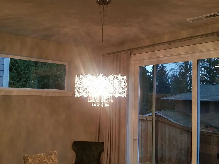 Dining room area with contemporary chandelier (picture from