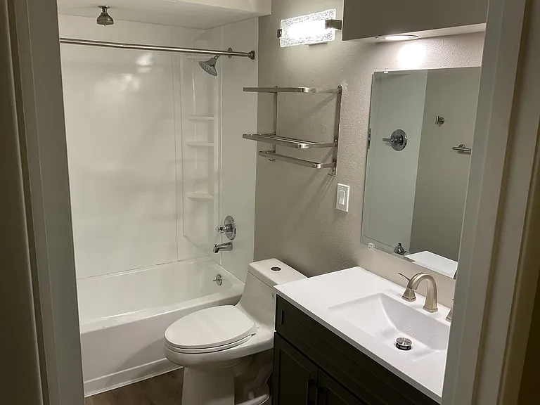 Newly remodeled bathroom with brushed nickel finishes