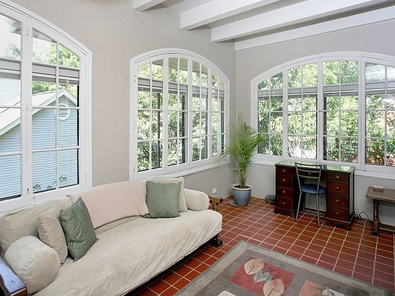 Family room with arched windows