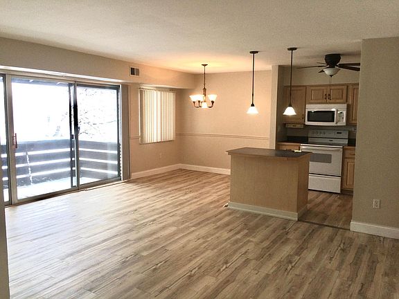 Deck, dining room, and kitchen