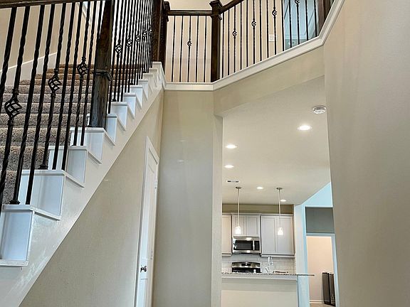 2 Story foyer. First floor features modern wood look tile!