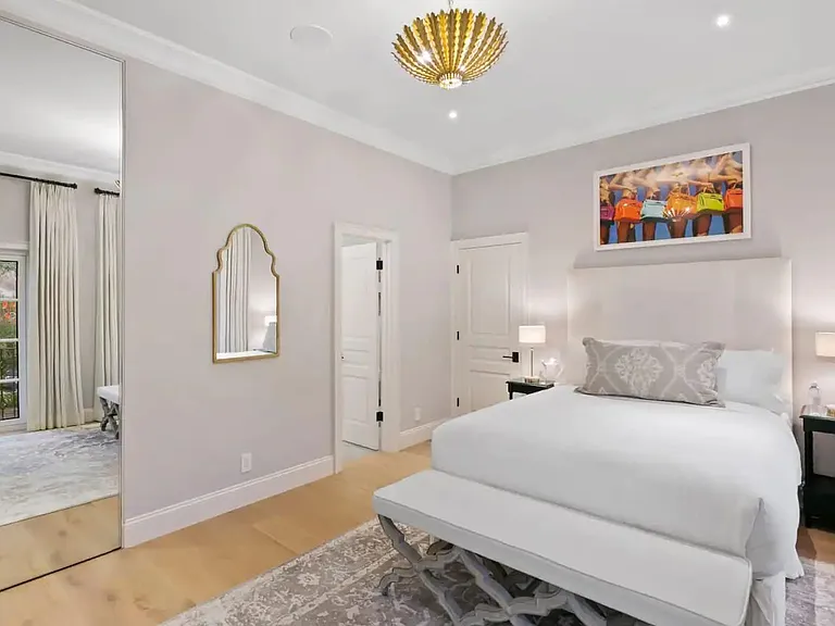 Queen bedroom with clean lines and superb artwork!