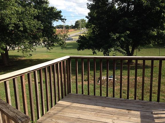 Huge fenced in back yard with deck