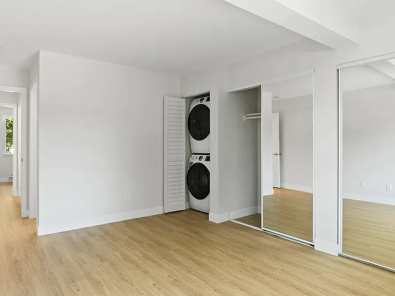 Bedroom with In-home Washer and Dryer