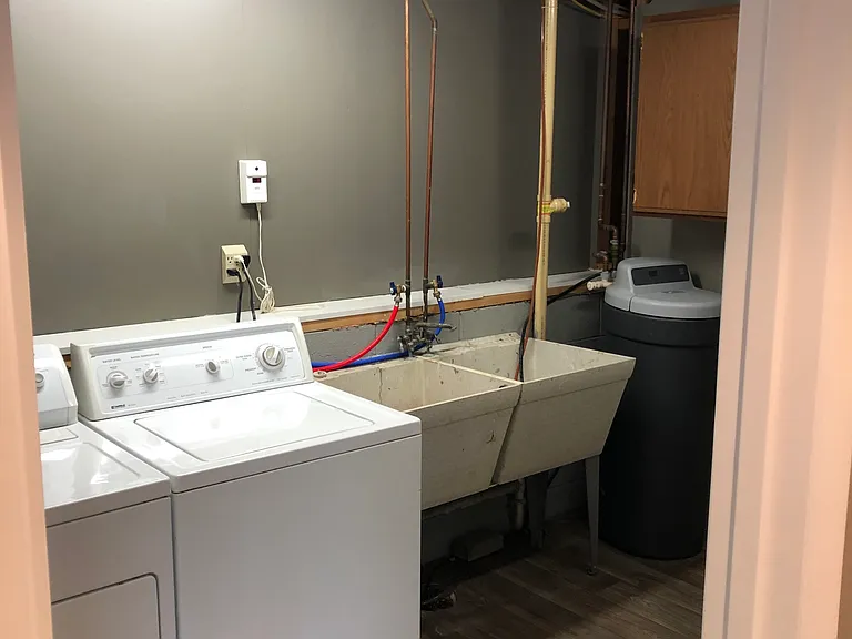 Basement laundry and utility room.