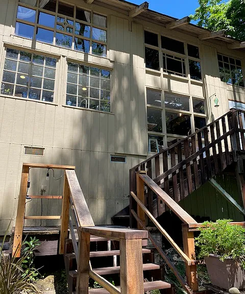 sideview of the cottage from the creekside deck