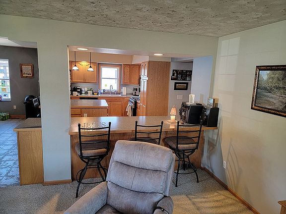 Counter with three chairs