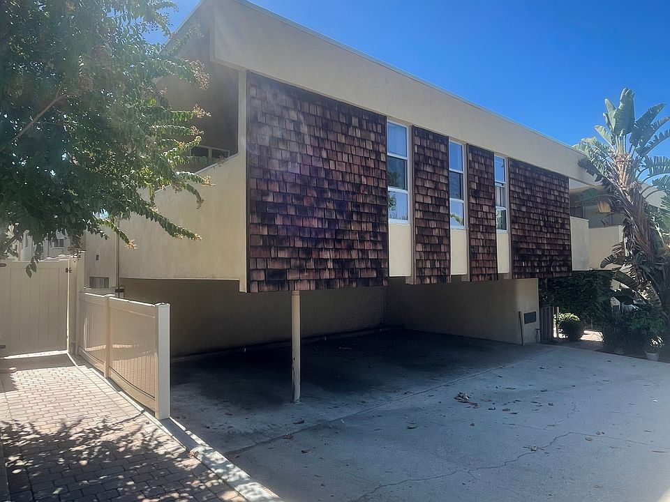 FRONT OF BUILDING ONE PARKING SPACE PER UNIT PROVIDED