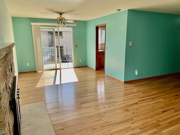 View to dining area and deck door from living room