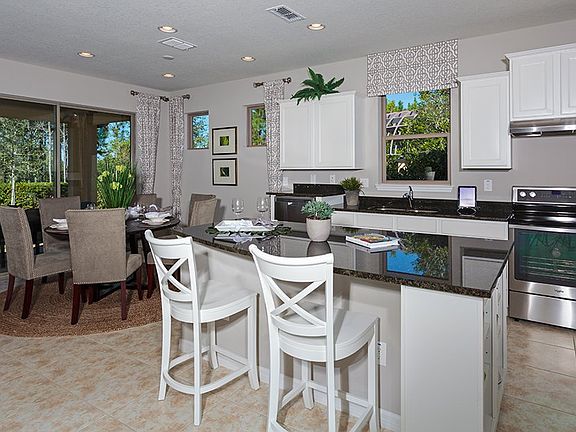 Ktichen with Granite Countertops and Barstool Setting