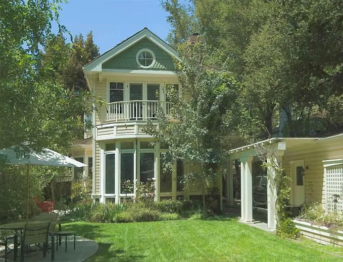 Large tree filled back yard