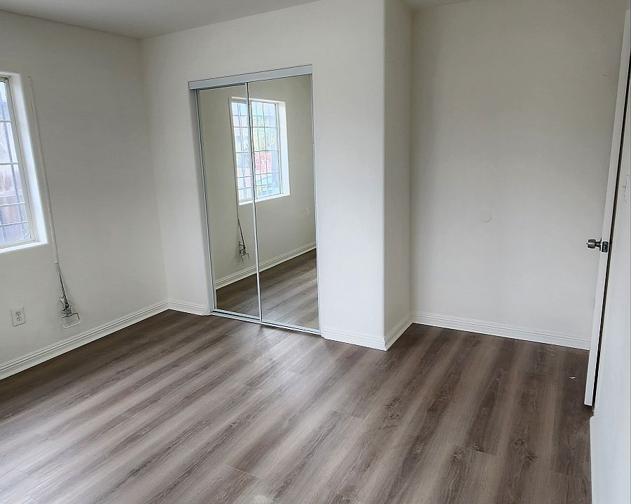 Room 2 - New Floor, New Door, New Light, New Closet door.