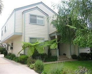 Cape cod style with front & side yards
