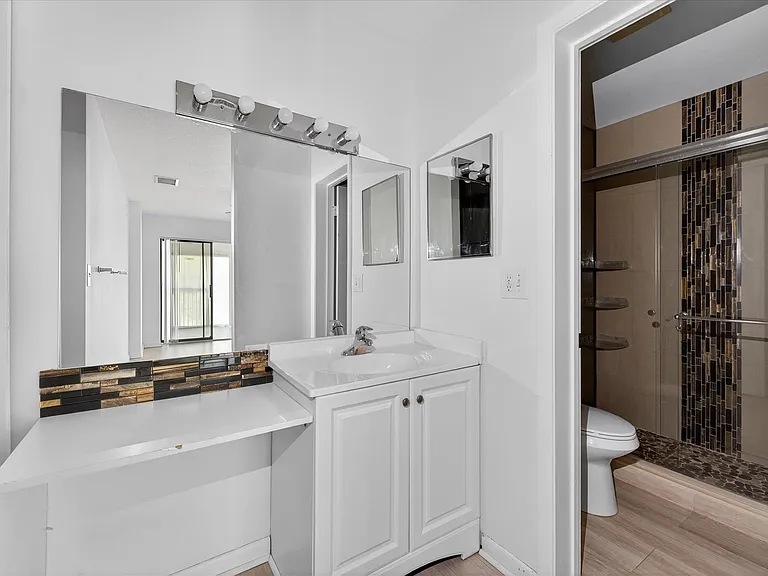 4467 Carambola Cir S — Photo 21