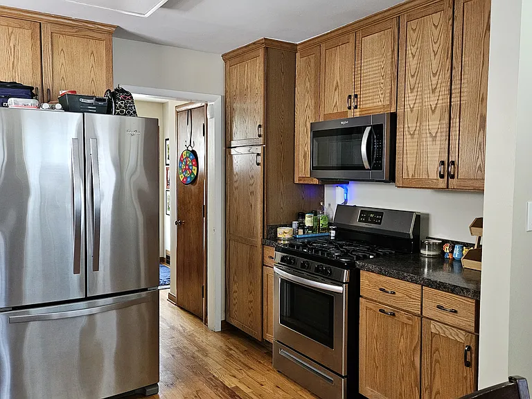 Giant Kitchen with Custom Maple Cabinets - All stainless newer appliances.