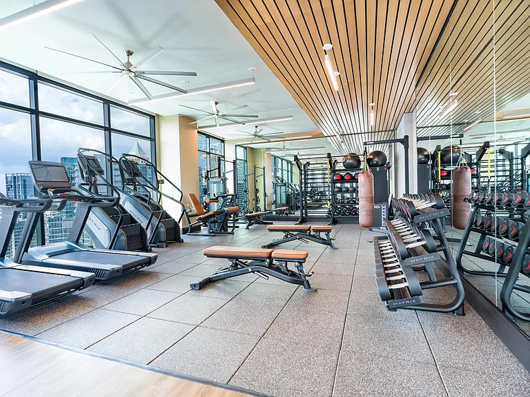 A fully equipped fitness center with skyline views supports every workout, with Midtown Atlanta just moments away for balance beyond the gym.