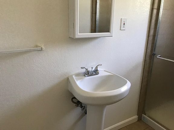 Bathroom with large tiled shower