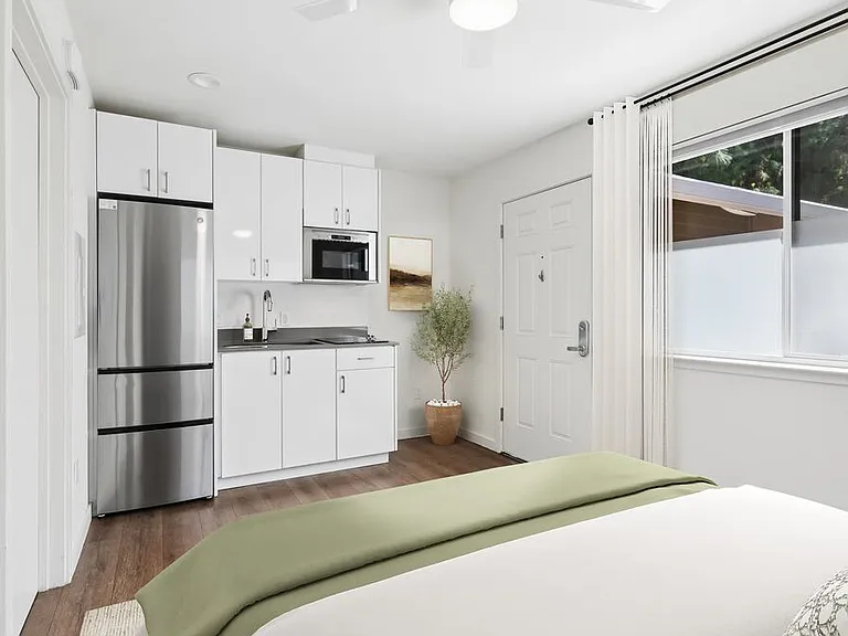 Classic Package II kitchen and living area with hard surface flooring