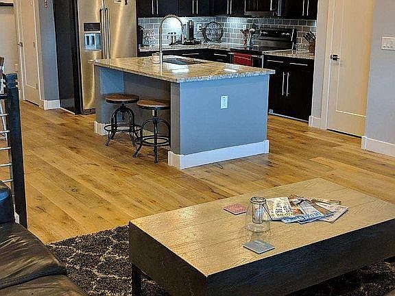 Granite island with upgraded appliances.