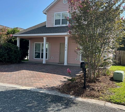 Side view front of house