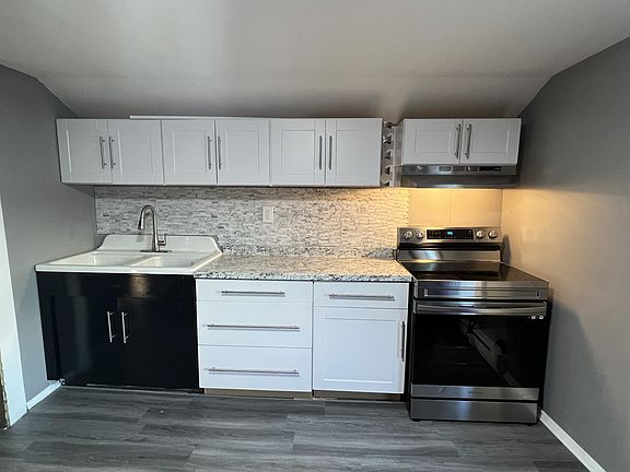 Kitchen with Full sized appliances and a large eat in space