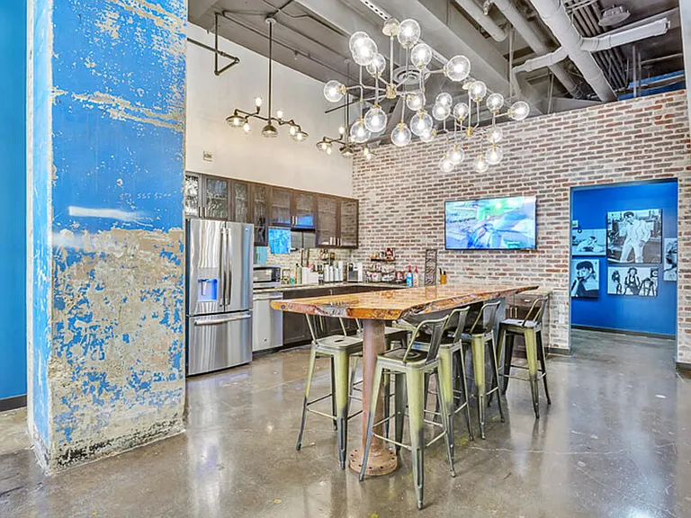 Conference table with kitchen and coffee machine