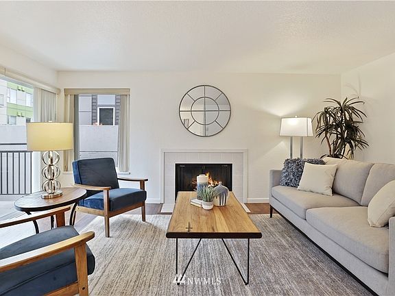 Enjoy your time at home in this wonderful place filled with light and updates galore!  This unique location in the complex with no neighbor below allows this unit to have the hardwood floors approved by the HOA.