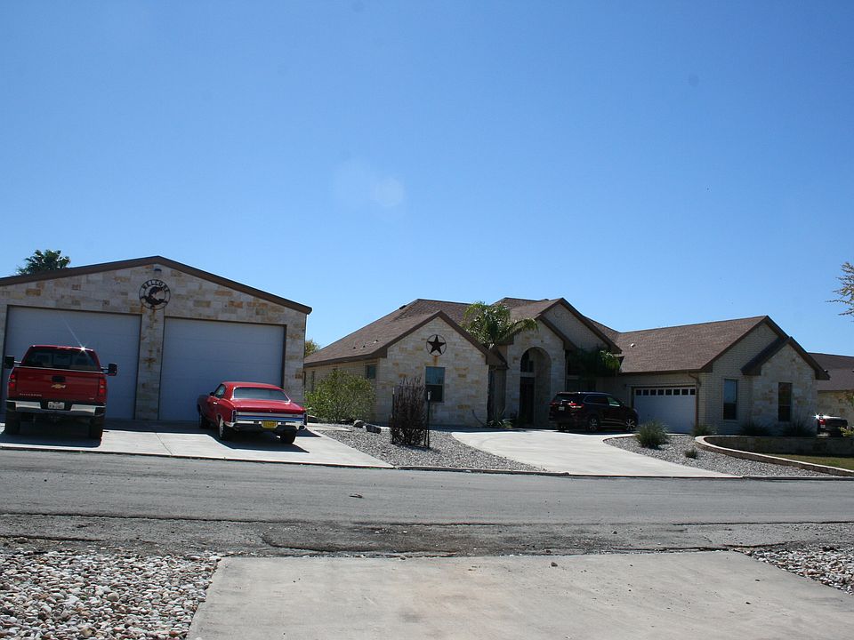front view of house and boat