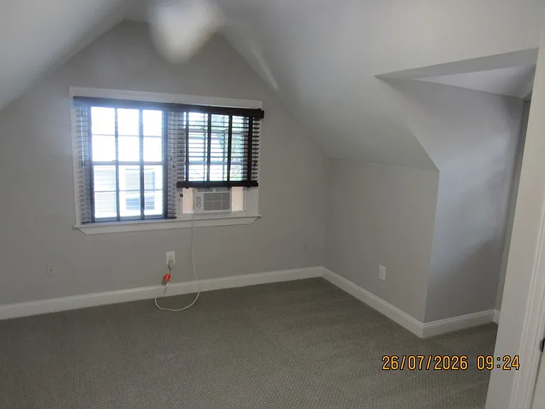 upper bedroom new carpets and extra window ac besides whole house AC