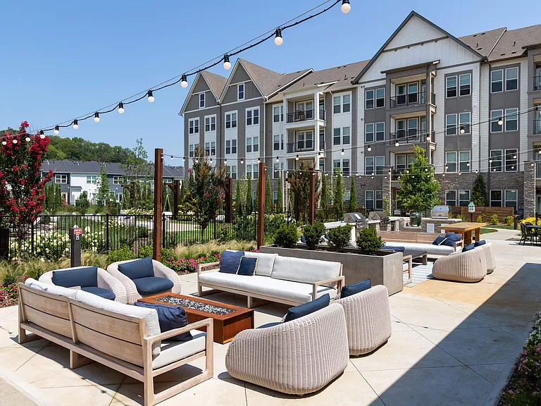 Outdoor Social Lounge at Harpeth Heights with Fire Pit and String Lighting