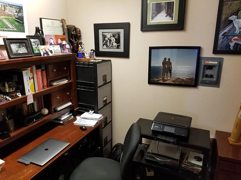Walk-in closet furnished as an office