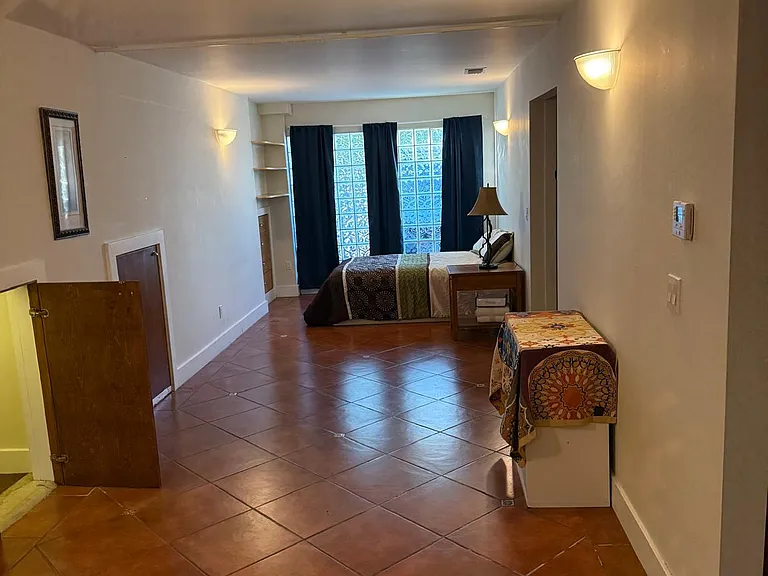 Hallway separating front and back of studio
