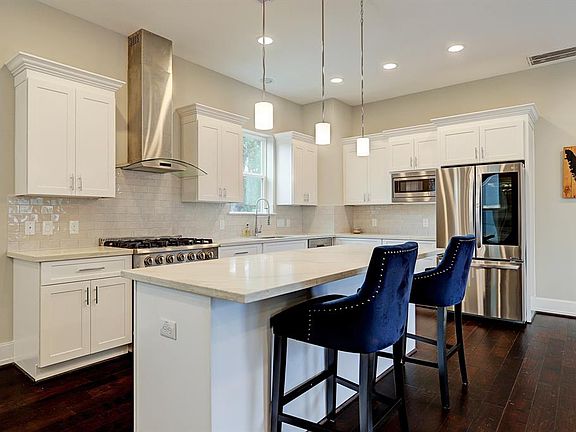 Modern kitchen with stainless steel appliances