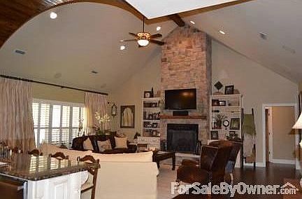 Open concept Living and Kitchen
						:
						Living includes surround sound, fireplace, built-ins, cathedral ceilings, etc