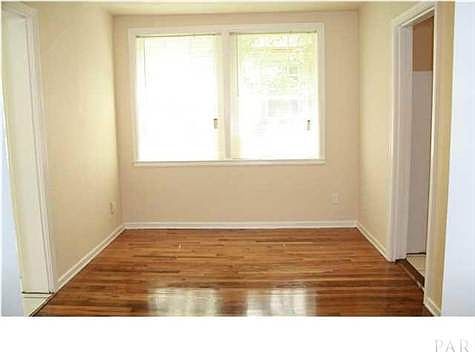 SEPARATE DINING ROOM BETWEEN SUNROOM AND KITCHEN