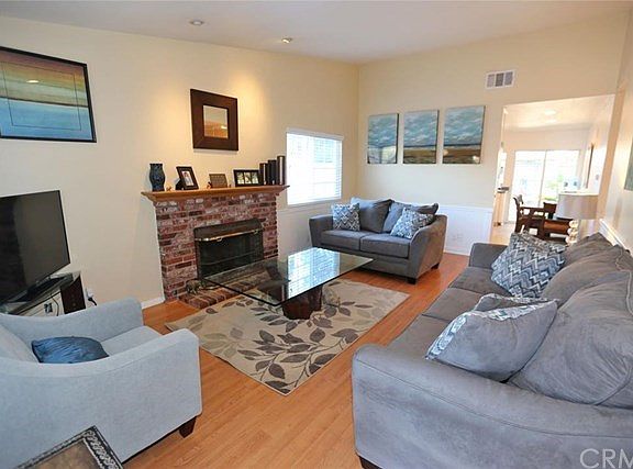 Light and bright living room with recessed lights.