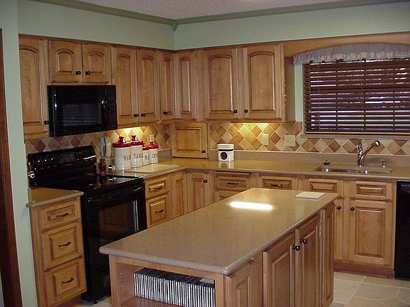 Newly remodeled kitchen; maple cabinets, corner susans, full extension drawers