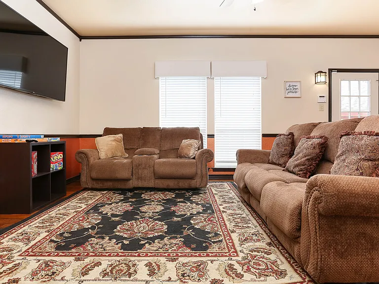 Second living area that is more casual with TV.