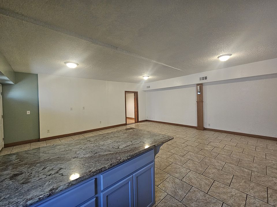 Living, Dining and Kitchen Areas
