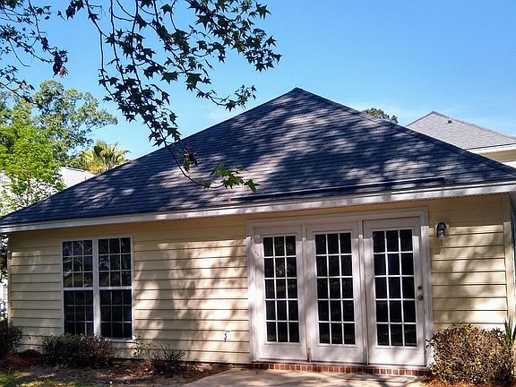 Back entry with patio.