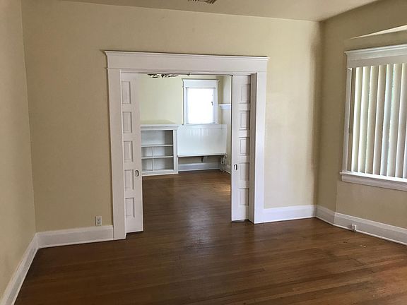 living room facing to dining room, hardwood floors