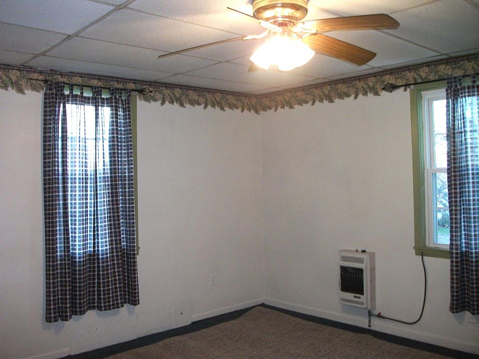 living room with electric heat and propane gas heat